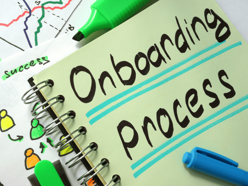 Notebook page that says "onboarding process"